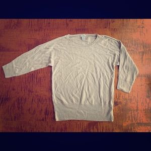 three quarter-sleeve sweater